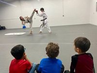 Akula-Taekwondo-students-watch-Joseph-Tegler-test-for-his-4th-degree-black-belt